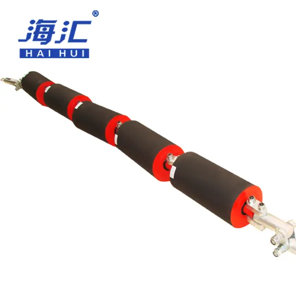 Suspended idler for heavy duty belt conveyor impact zone protection